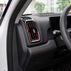 byd shark Car interior with a close-up of the air vent and dashboard.