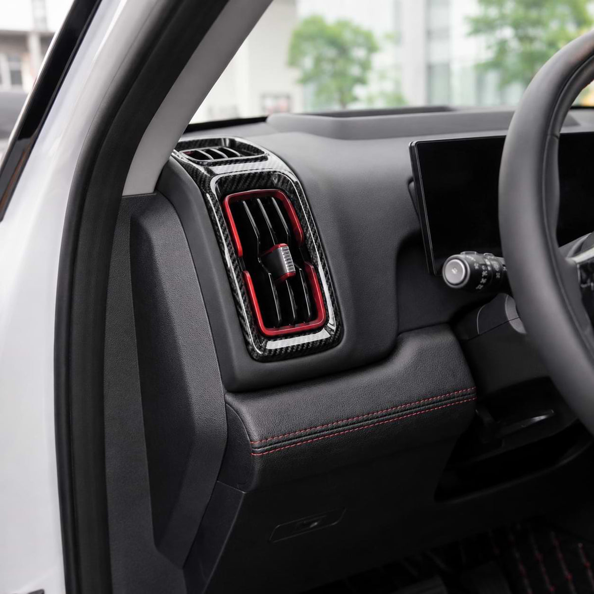 byd shark Car interior with a close-up of the air vent and dashboard.