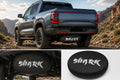 BYD Shark 6 spare tire cover with Shark logo mounted under pickup truck chassis