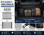 BYD Shark 6 trunk storage net organizer securing luggage and cargo inside BYD Shark 6 cargo area