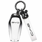 Premium zinc alloy and leather car key case cover with keychain for BYD Song Plus, Atto 3, Han EV, Qin, Seal and Dolphin smart key fob protection.