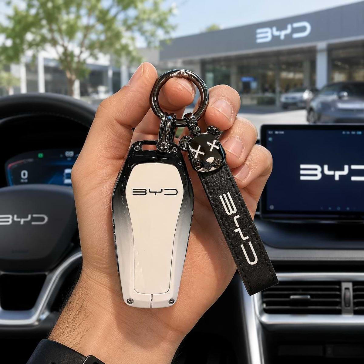 Premium zinc alloy and leather car key case cover with keychain for BYD Song Plus, Atto 3, Han EV, Qin, Seal and Dolphin smart key fob protection.