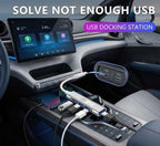 byd USB docking station in a car console with multiple devices connected
