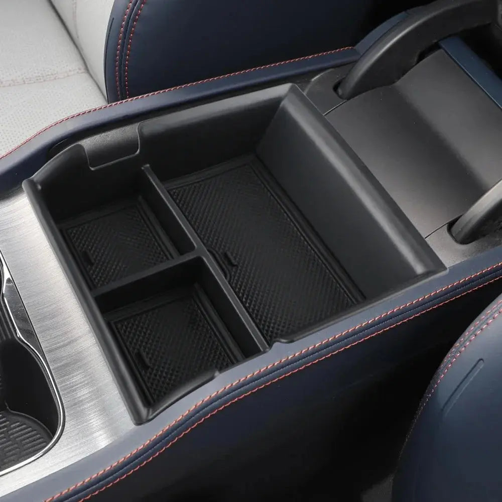 byd Car console organizer with compartments in a vehicle interior.