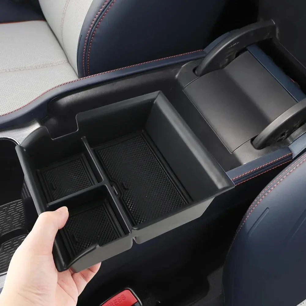 byd atto 3 Black car storage compartment with divided sections