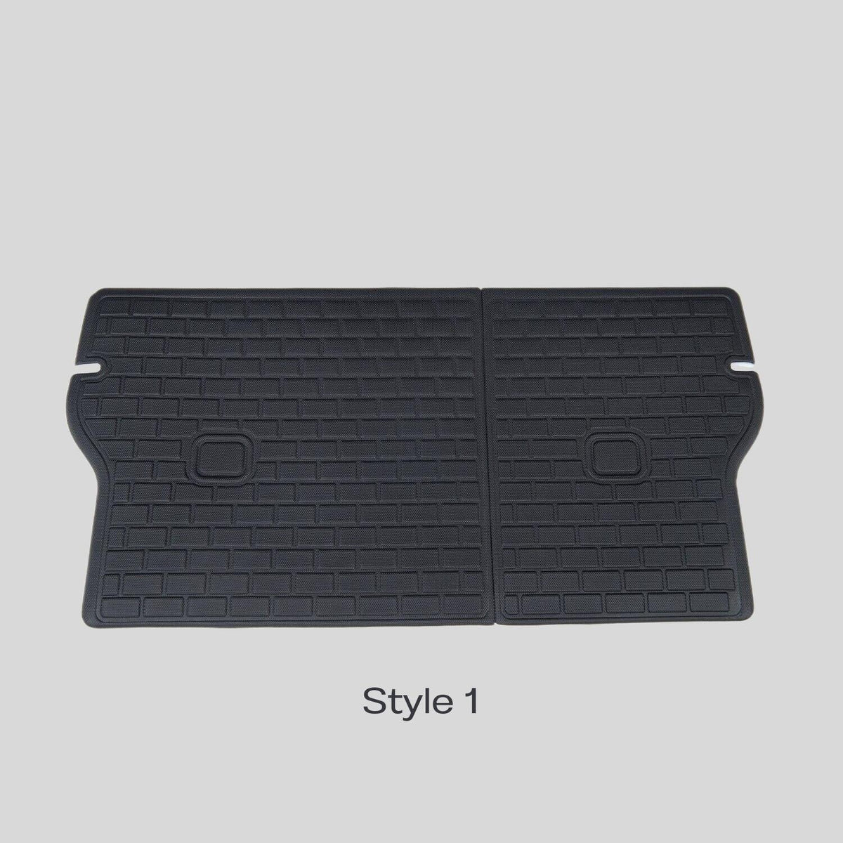 Black TPE waterproof car trunk mat with anti-slip brick pattern texture.