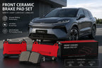 Front ceramic brake pad set displayed in front of a BYD Tang L SUV, compatible with BYD Tang L, BYD Atto 8, and DENZA N7 for reliable OEM-quality braking.